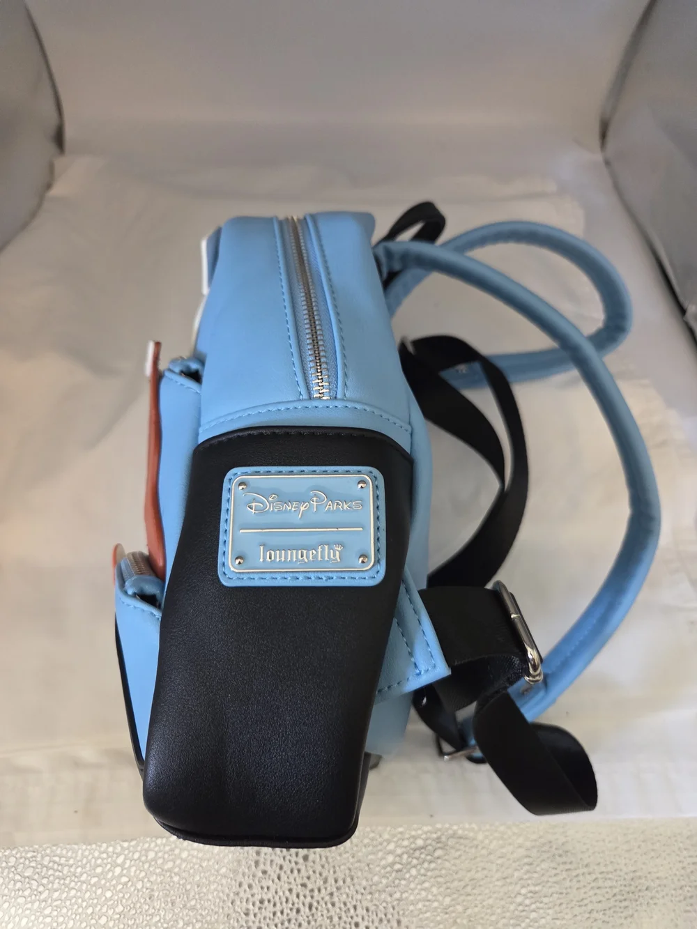 Loungefly Disney Parks Mini Backpack Festuring Rolly, Lady & Pluto